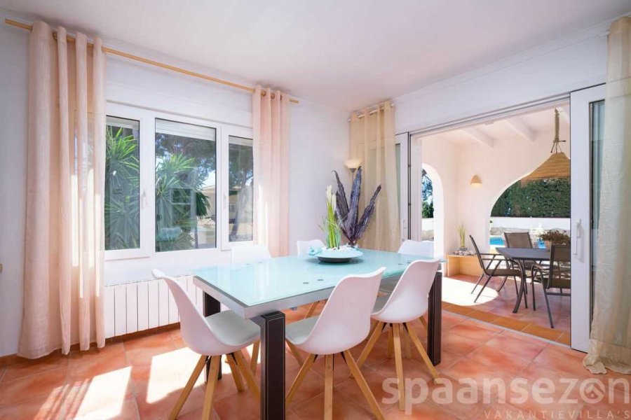Casa Alicia with a dinning room and sliding doors to the terrance