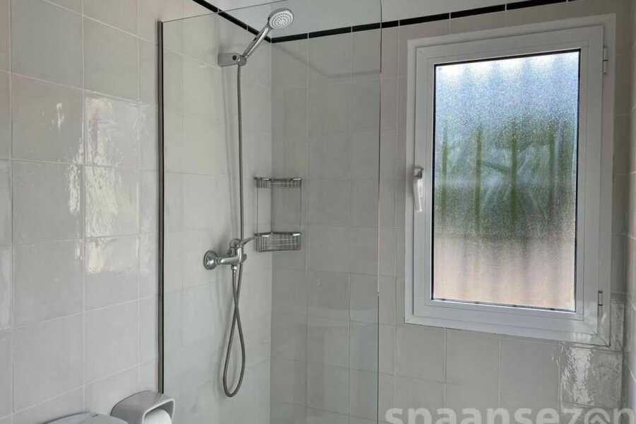 Bathroom with shower, sink and toilet