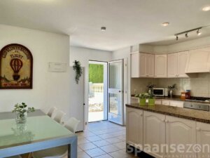 Open kitchen with dinning table in rental villa Lara