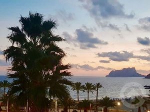 Moraira Suites by night with sea view