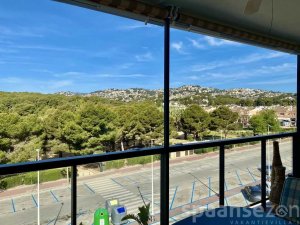 Moraira Suites in the center of Moraira has a large balcony with view on the park