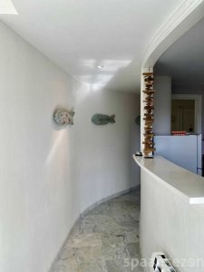 The hall of Moraira Suites connects every room