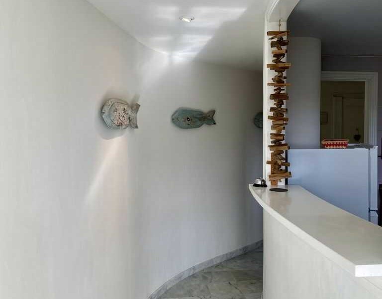 The hall of Moraira Suites connects every room