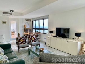 Light living room with sea views