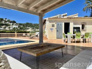Casa Maia in Moraira has a covered lounge area in the garden