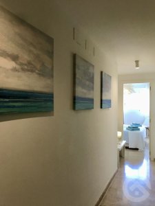 Penthouse Moraira with long hall that gives access to the bedrooms and bathrooms