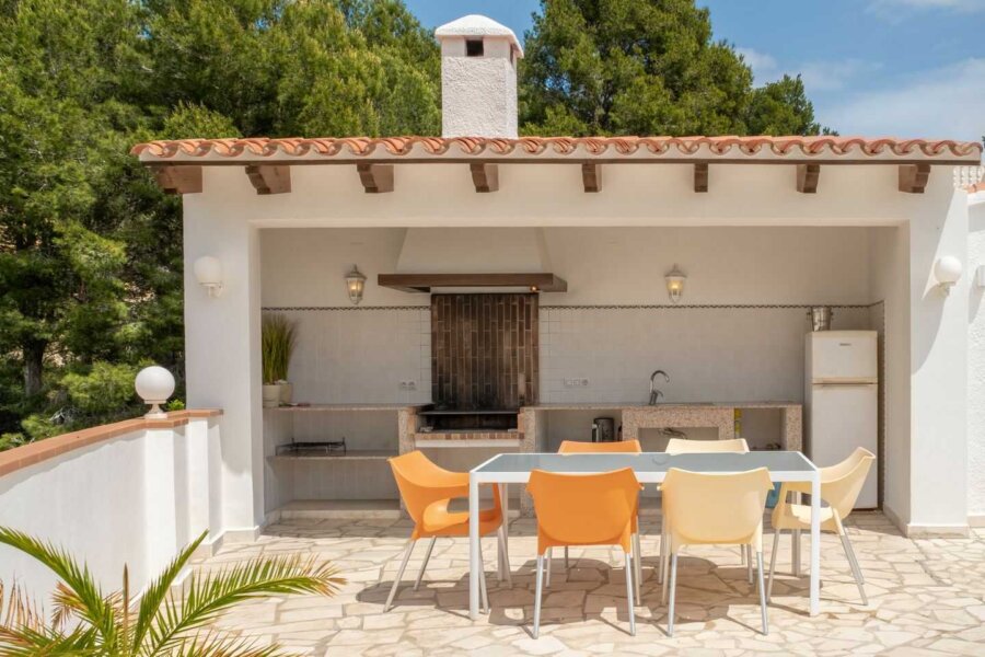 Holiday villa Naranja with a outdoor kitchen including a bbq