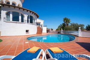 Sea view Villa Rosana in Moraira has sun beds around the private pool