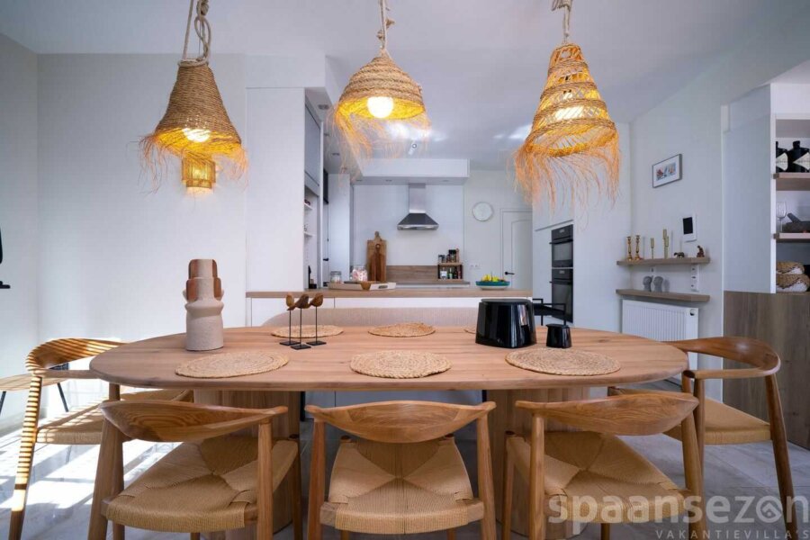Villa La Serena in Moraira with massive dinning table in front of the open kitchen