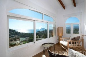 Villa Bahia del Portet in Moraira has a master bedroom with beautiful views.