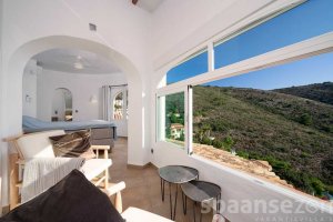 Villa Bahia del Portet in Moraira has a master bedroom with beautiful views.