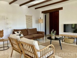 This villa in Benissa has a spacious and bright living room with Mediterranean influences.