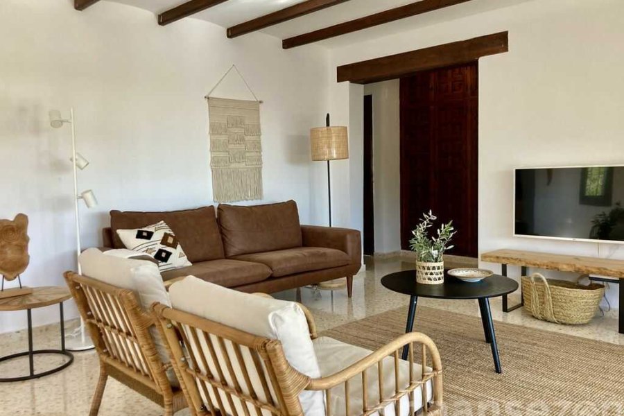 This villa in Benissa has a spacious and bright living room with Mediterranean influences.