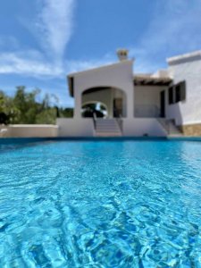This villa in Benissa has a private swimming pool in the garden.