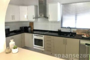 Holidayvilla Juntos with modern half open kitchen.
