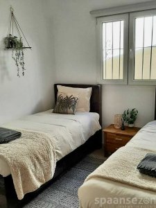 Two single beds in bedroom at villa Terramar Benissa Costa