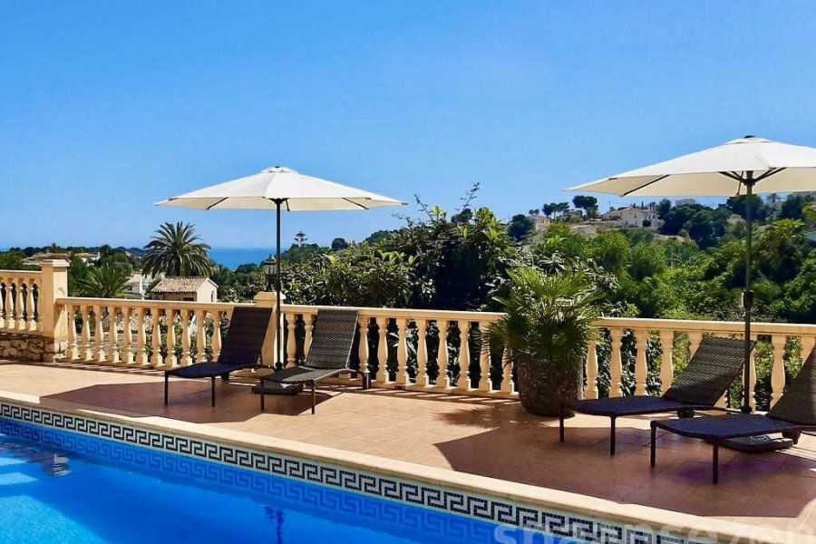 Sunbeds at the terrace of villa Terramar in Benissa Costa