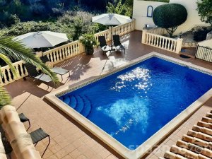 Private swimmingpool with terrace at villa Terramar
