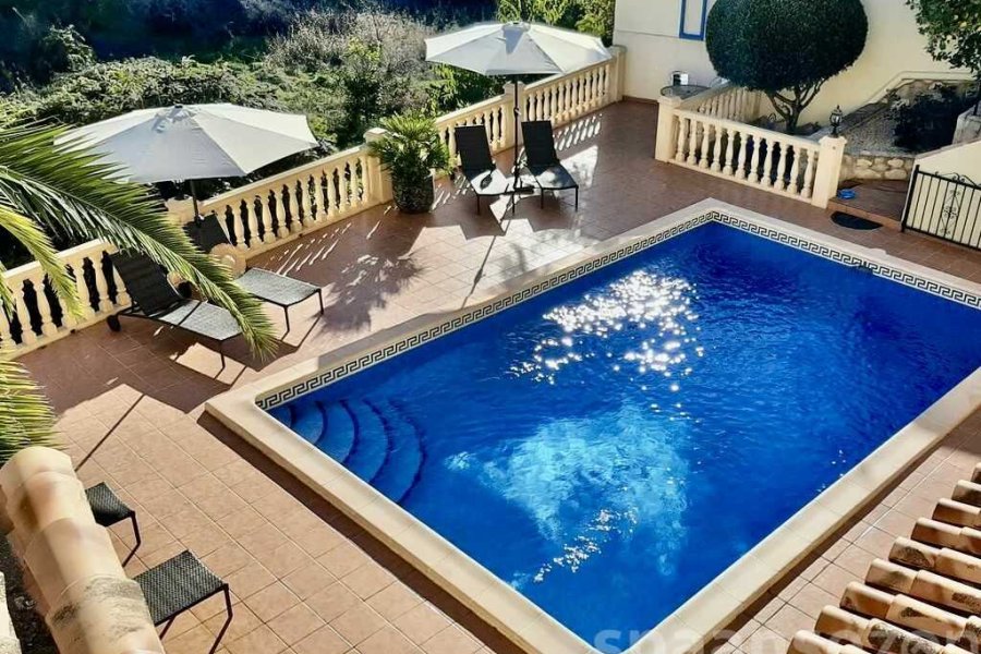 Private swimmingpool with terrace at villa Terramar