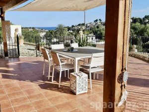 Shaded seating area with seaview