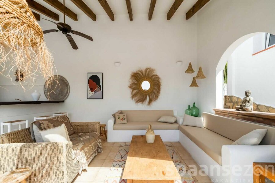 Villa Paraiso in Moraira has a covered terrace by the pool with a lovely lounge sofa