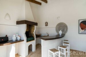 Villa Paraiso in Moraira has a covered outdoor kitchen with BBQ